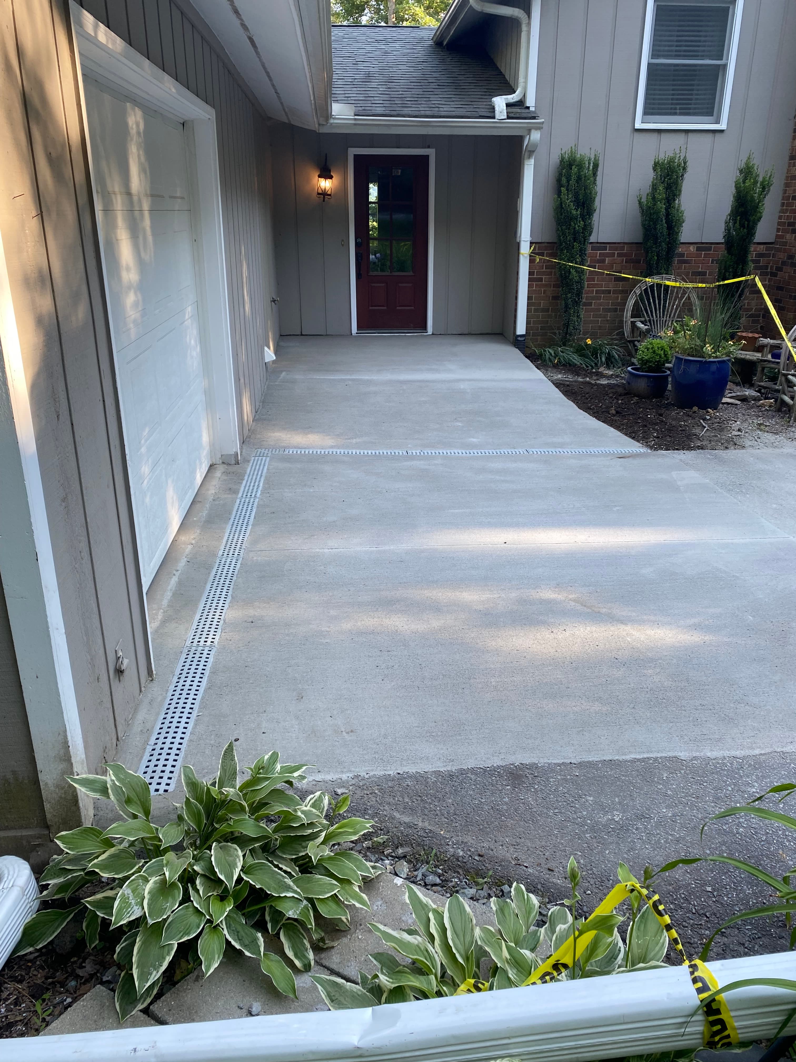 After photo of a finished driveway and entry concrete project
