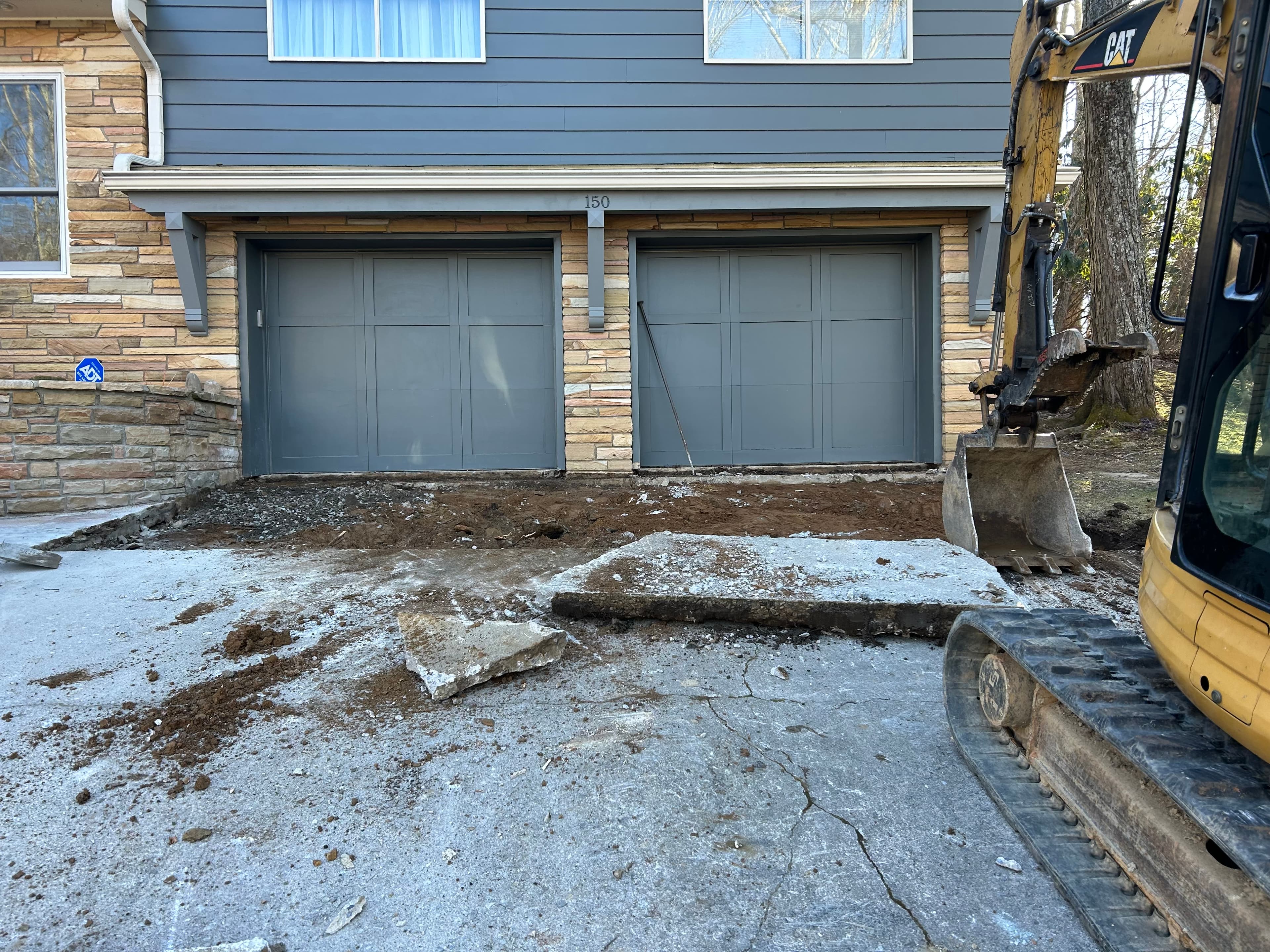 Driveway project during demolition before the new pour
