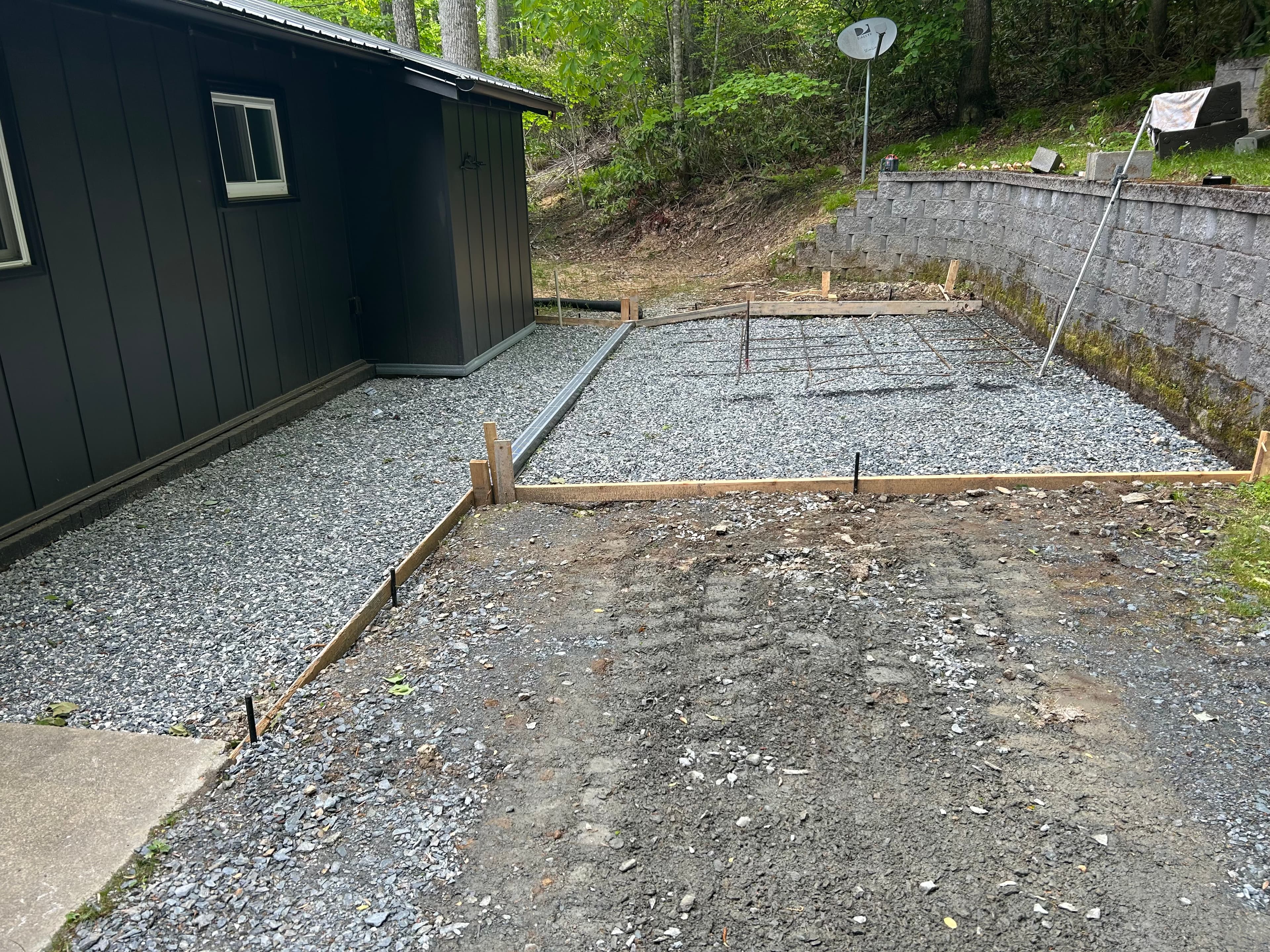Patio area prepared with forms and gravel base
